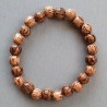 Bracelet composé de perles en bois de coco